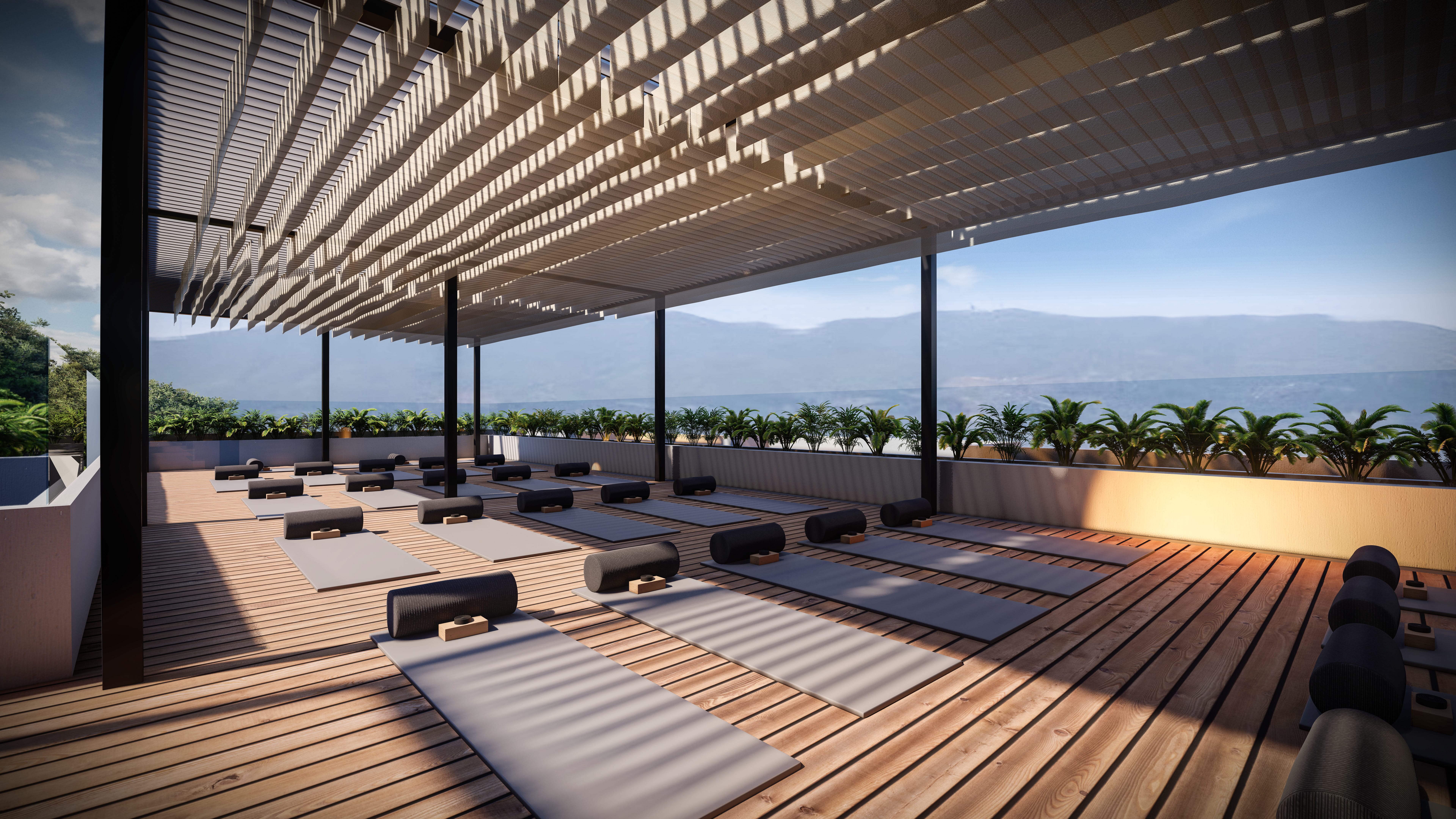 a large room with a large glass roof and a view of the ocean