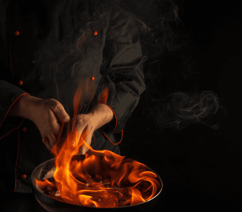 a fire burning in a pit