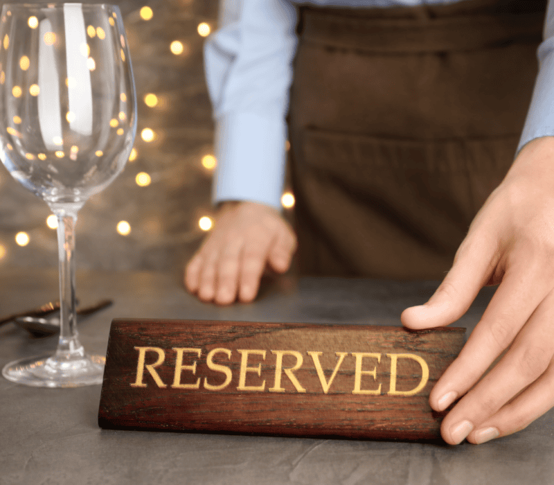 a person holding a wine glass