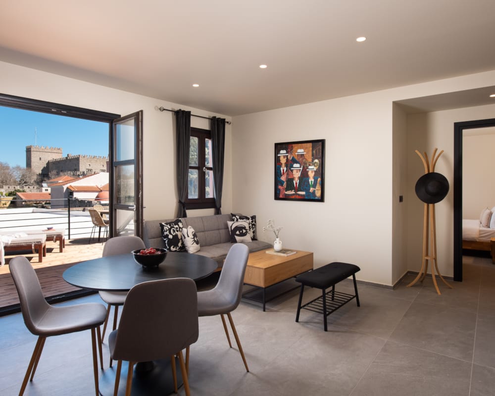 a room with a table and chairs