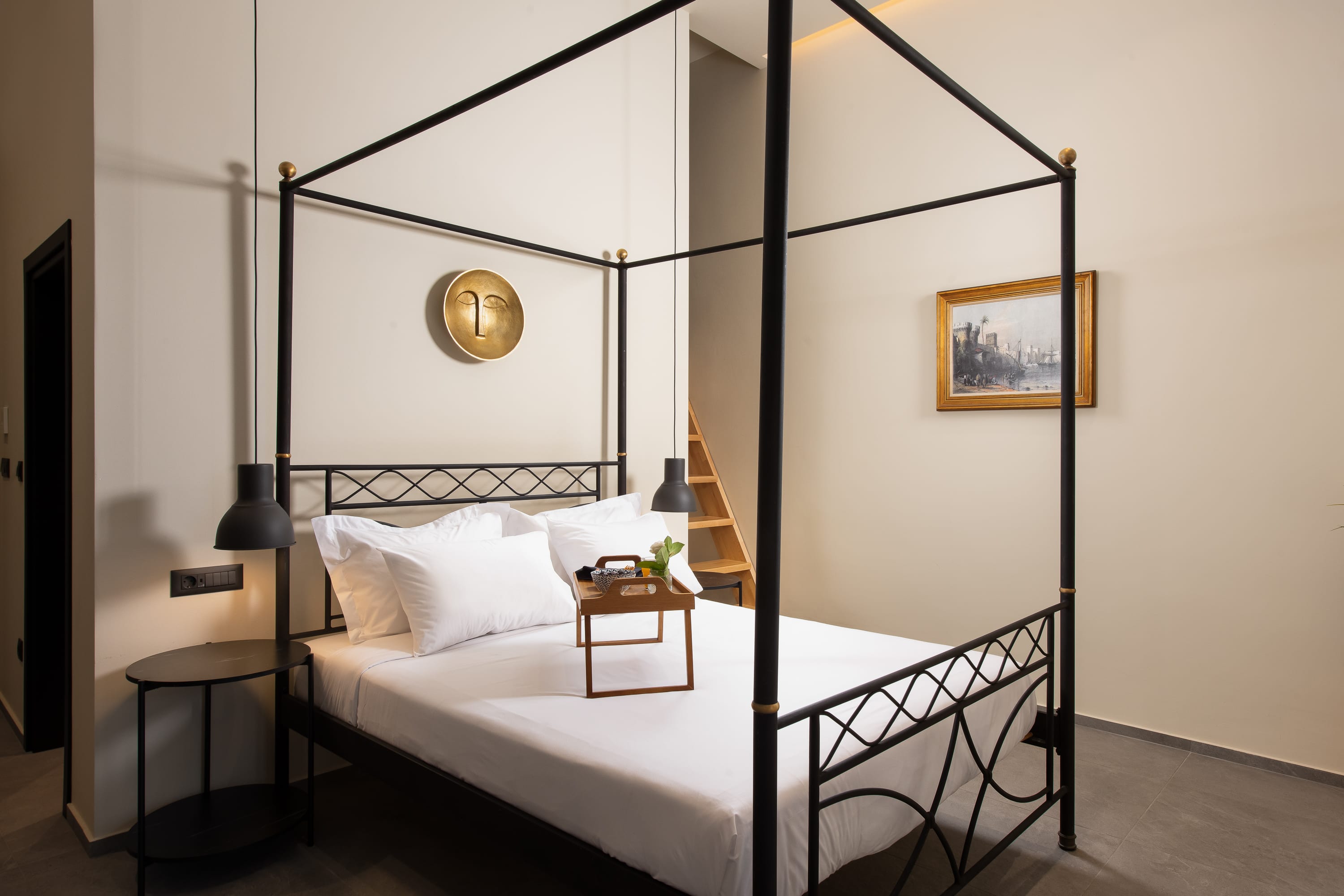 a bed with a mirror on the wall