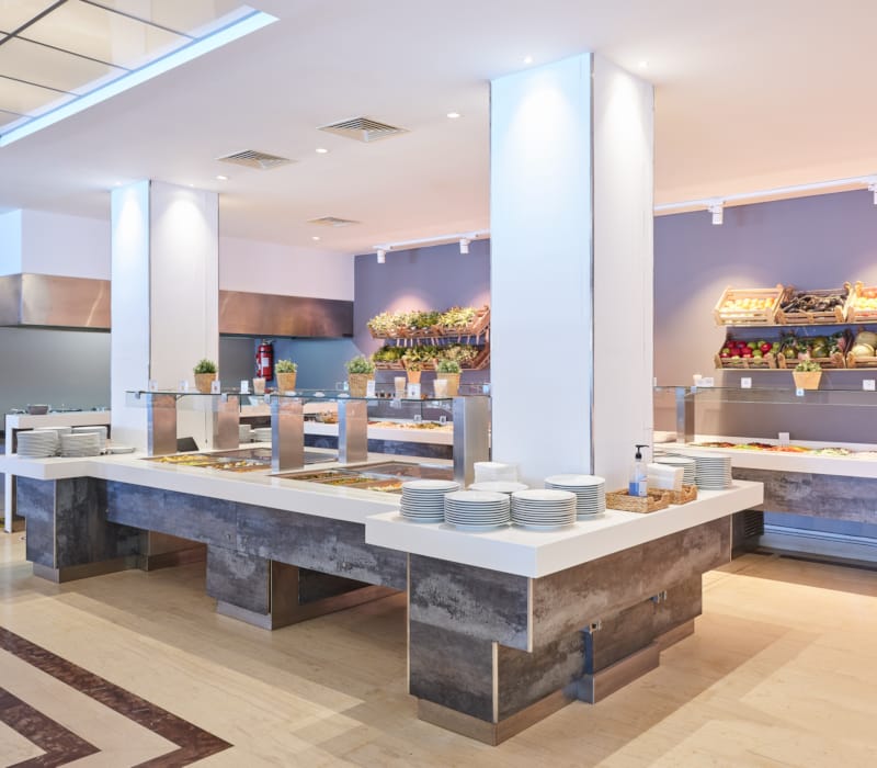 a large kitchen with a large counter