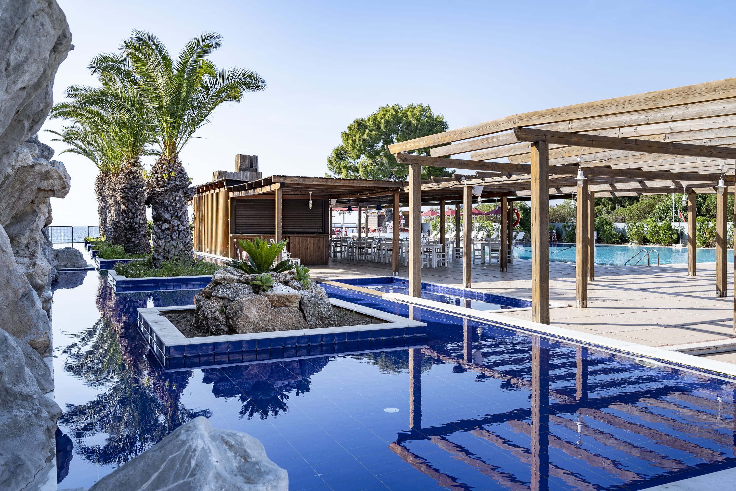 a swimming pool with a covered area