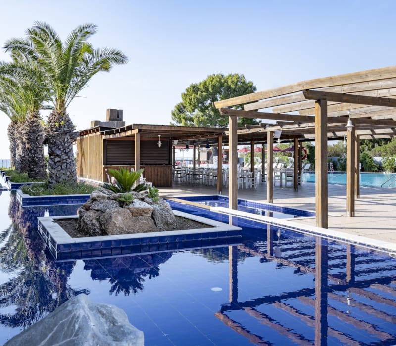 a swimming pool with a covered area