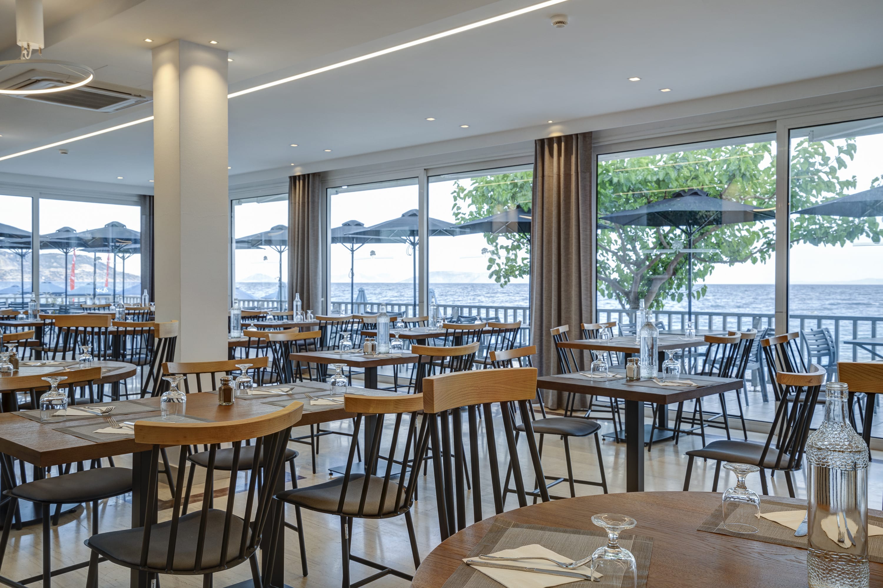 a room with tables and chairs