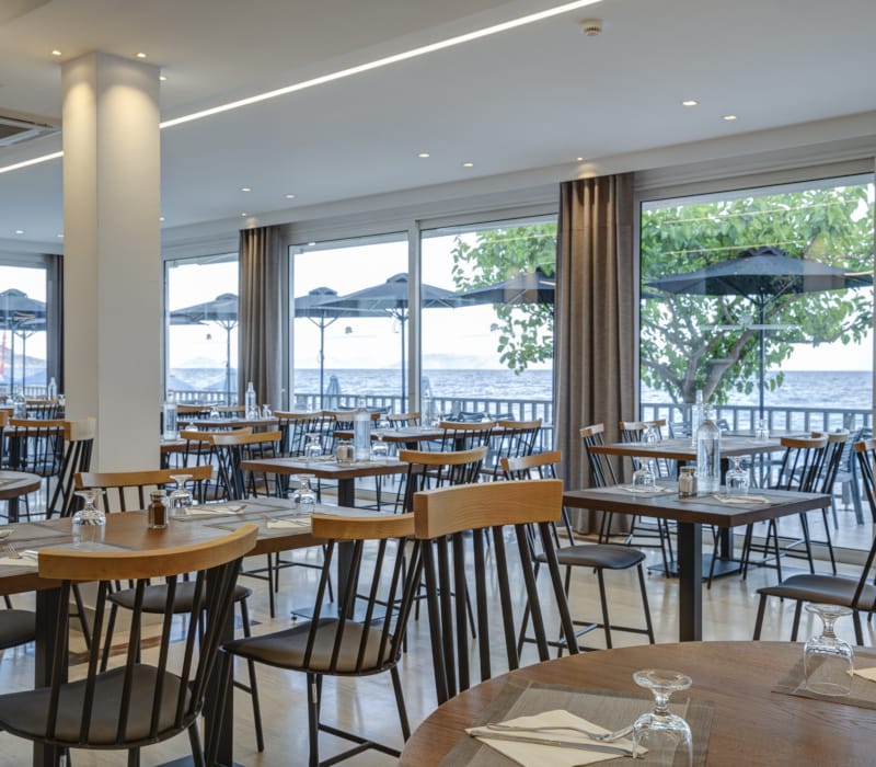 a room with tables and chairs