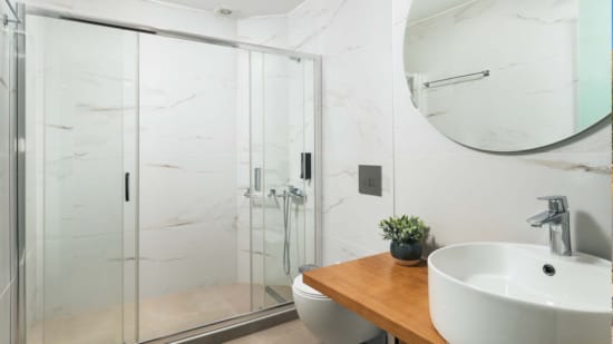 a bathroom with a glass shower