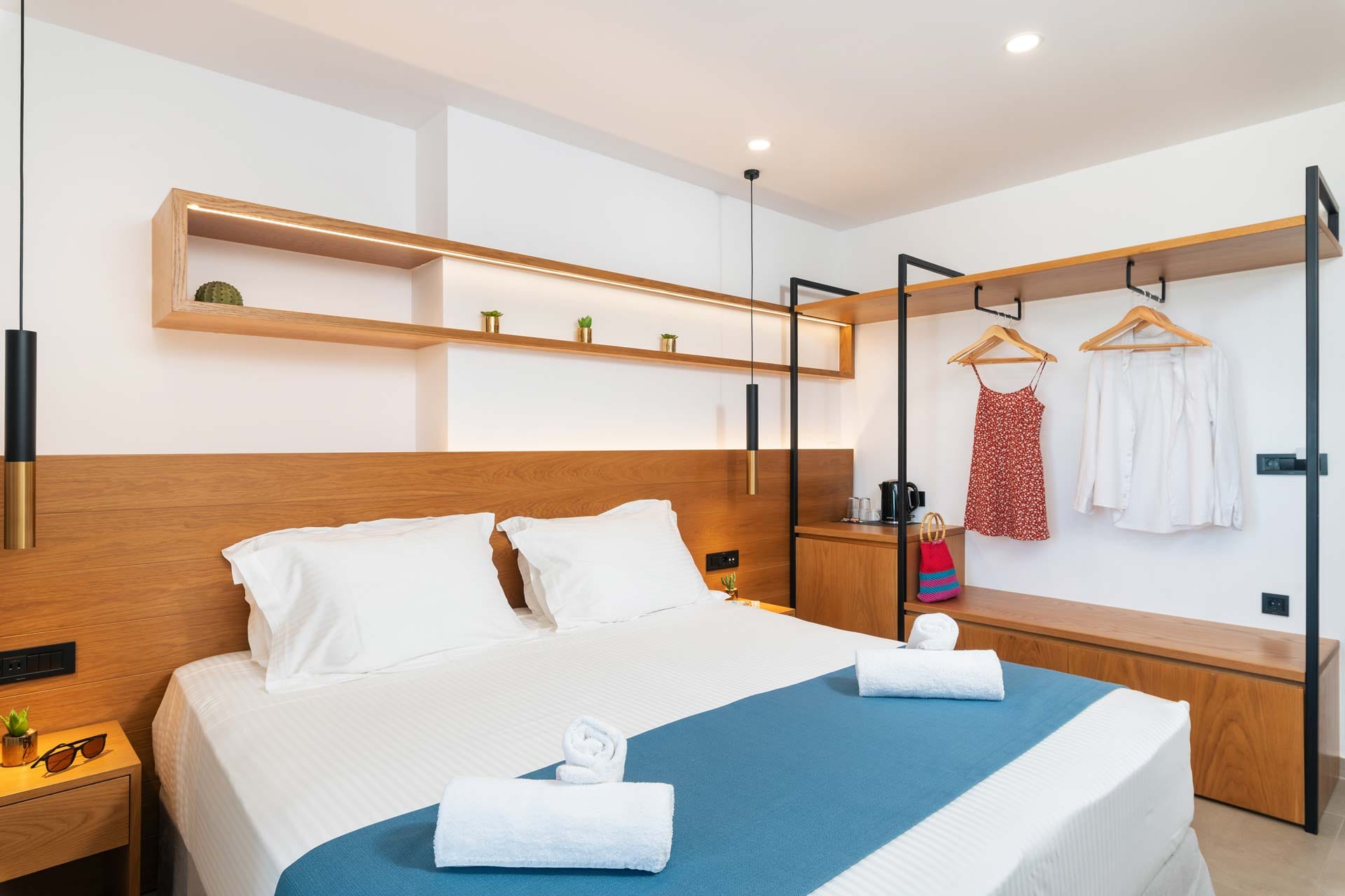 a bed with a white bed spread