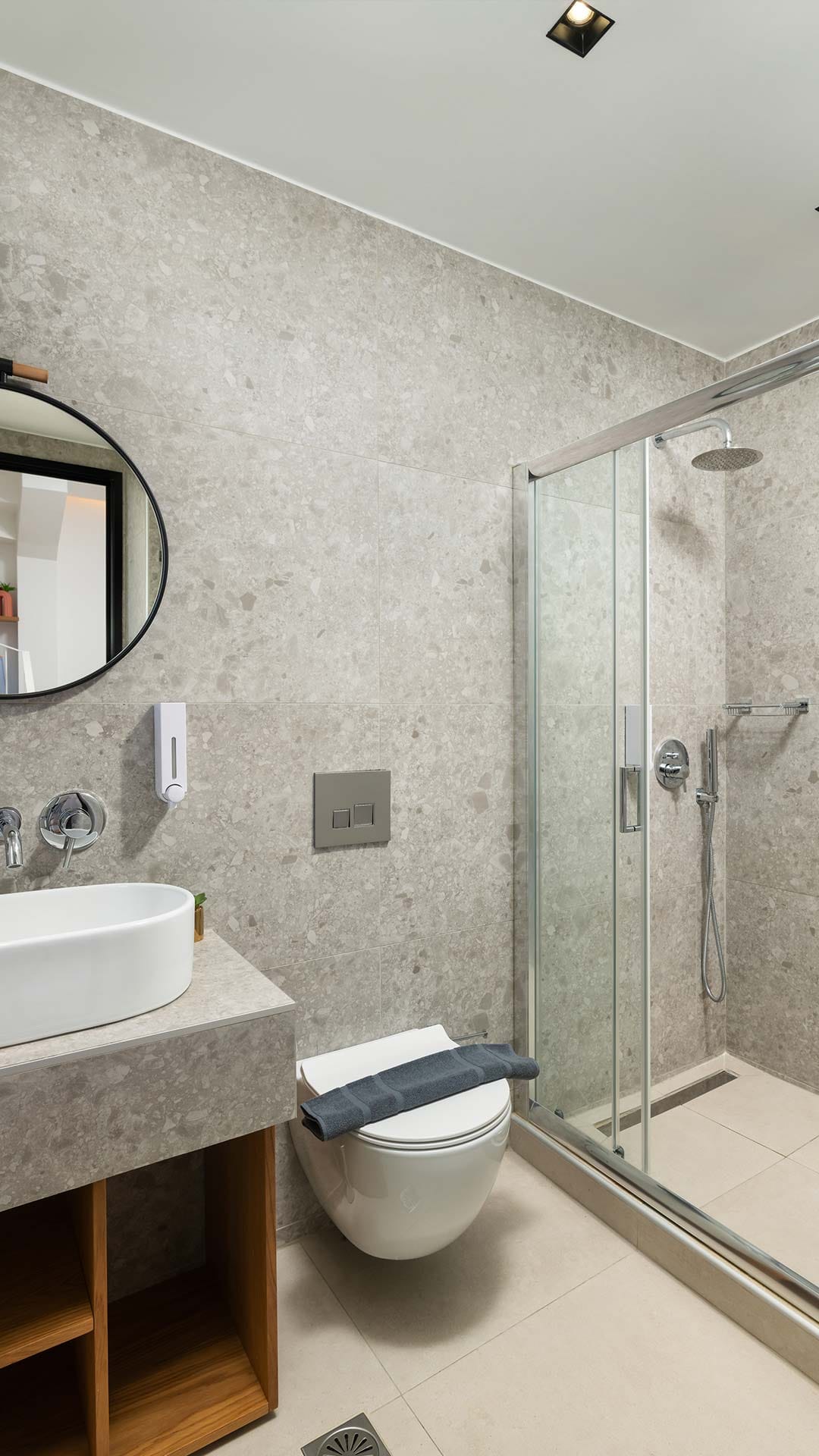 a bathroom with a glass shower