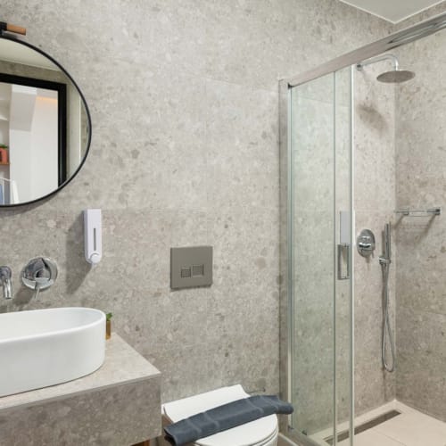 a bathroom with a glass shower