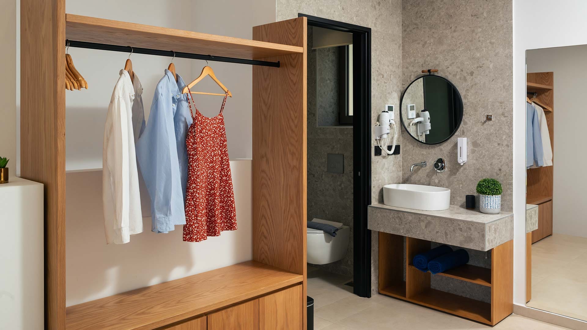 a bathroom with a mirror and a sink
