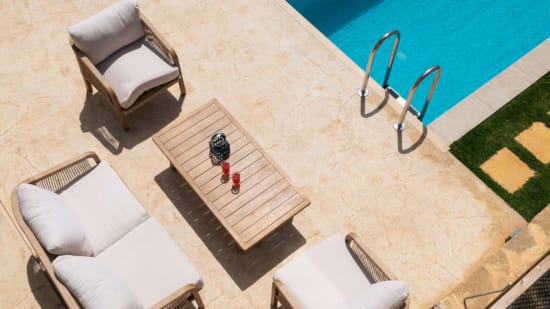 a room with a table and chairs