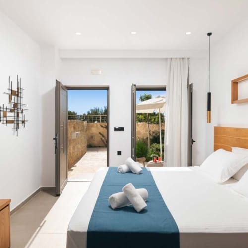 a bedroom with a large window