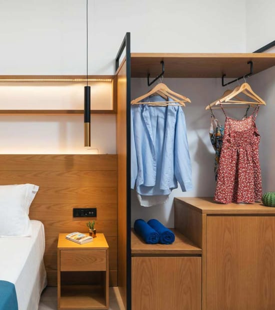 a closet with clothes