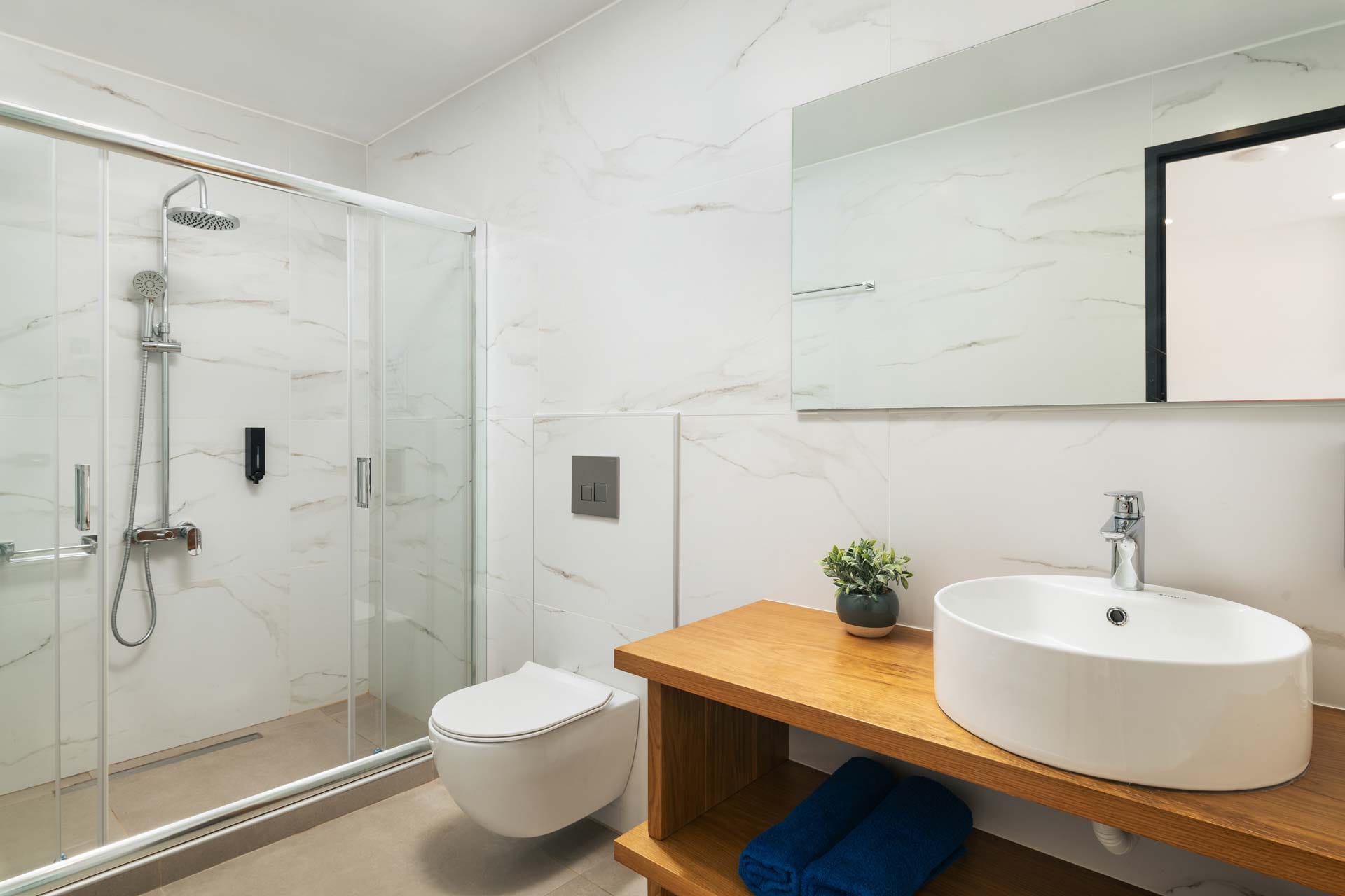 a bathroom with a sink and toilet