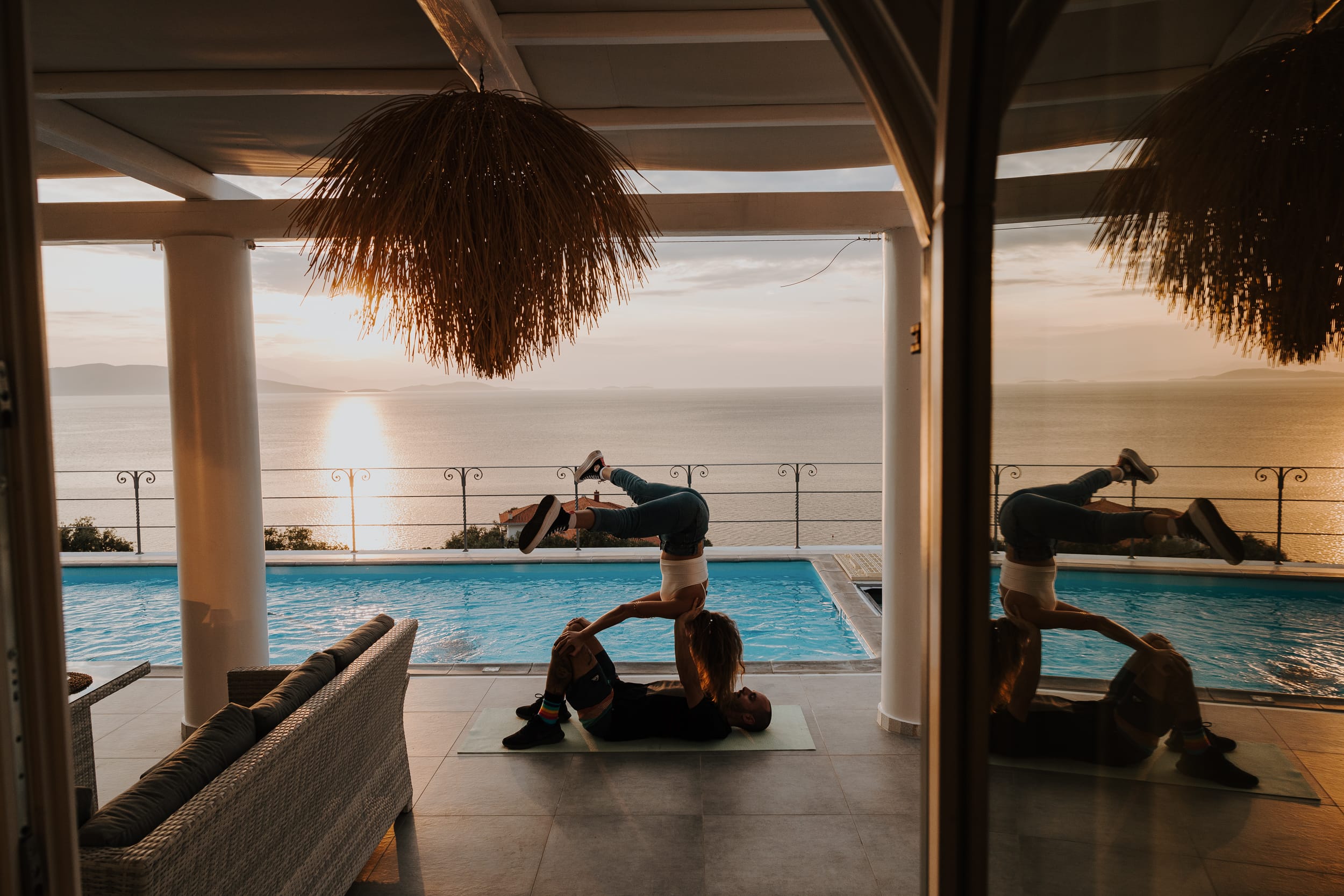 a group of people exercising in a swimming pool