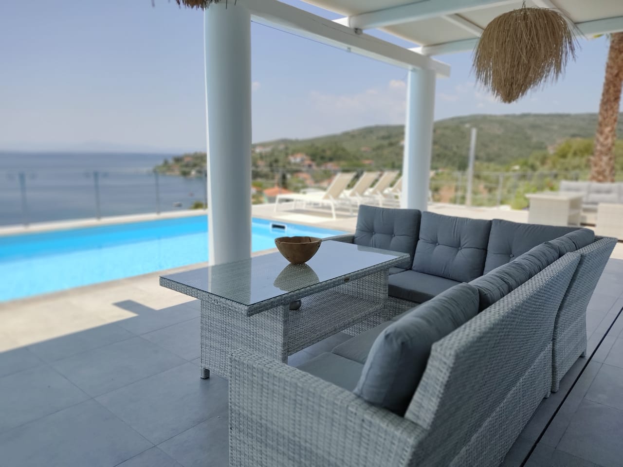 a pool with a table and chairs