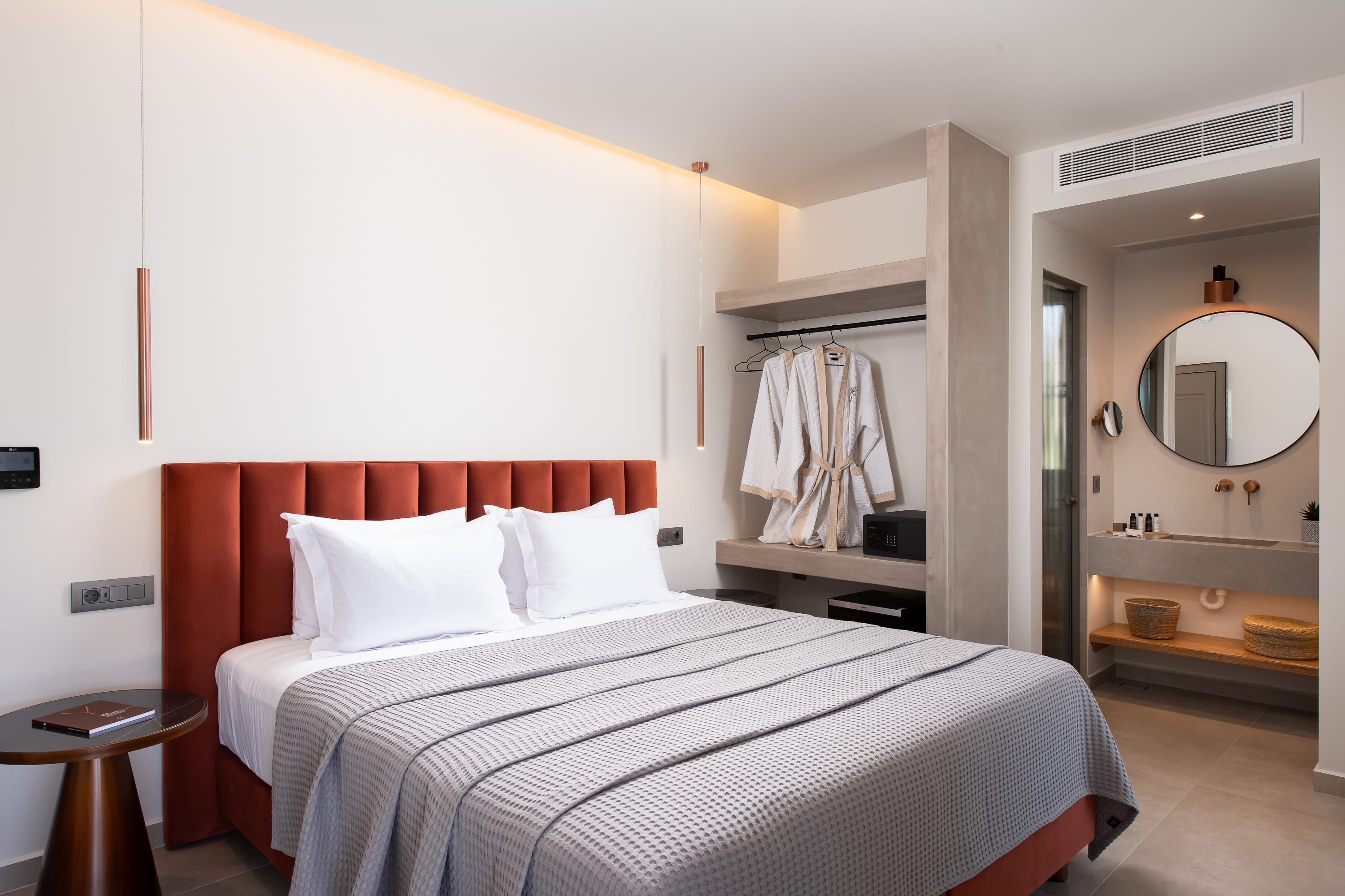 a bedroom with a large mirror