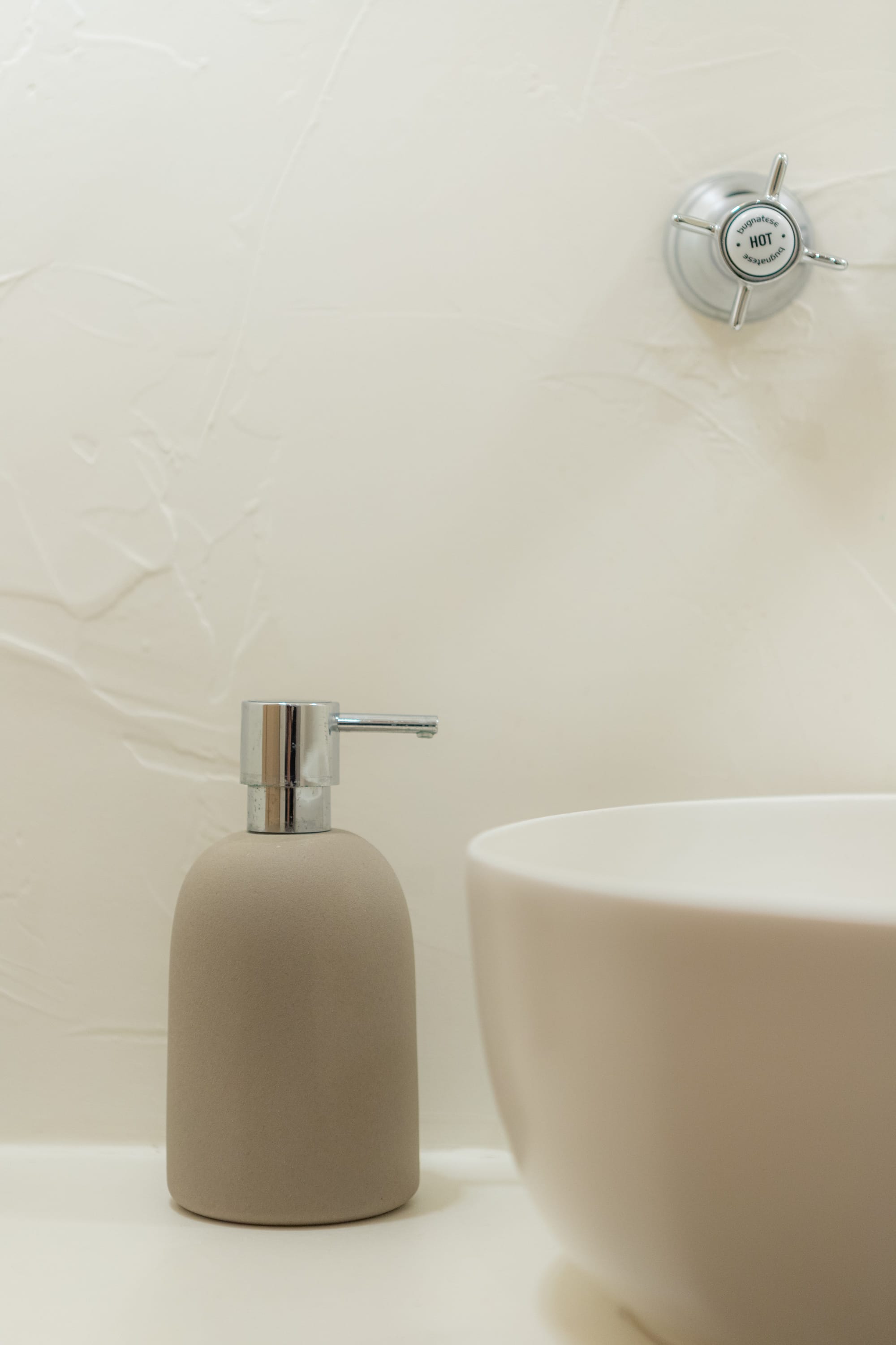 a white sink and a white toilet