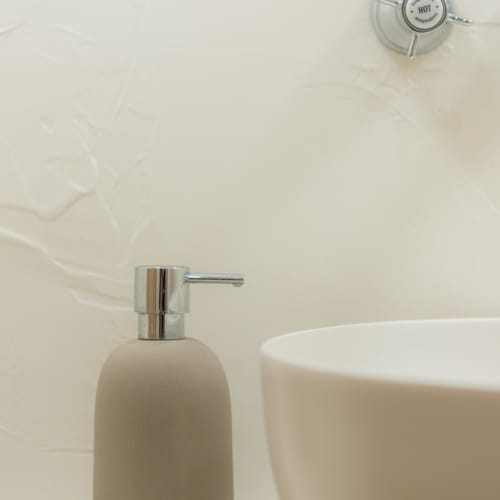 a white sink and a white toilet