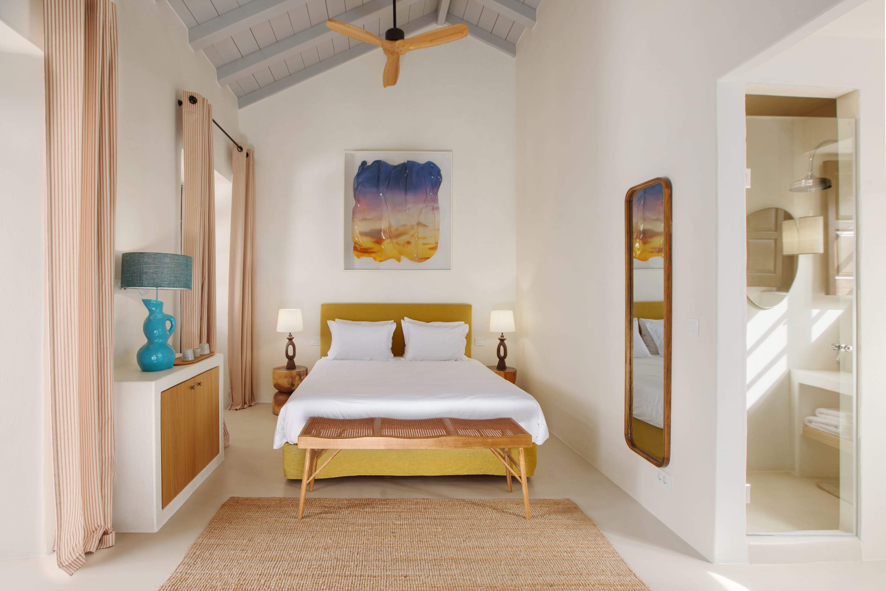 a bedroom with a large bed