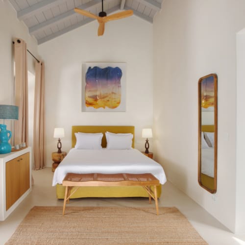 a bedroom with a large bed