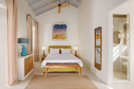 a bedroom with a large bed