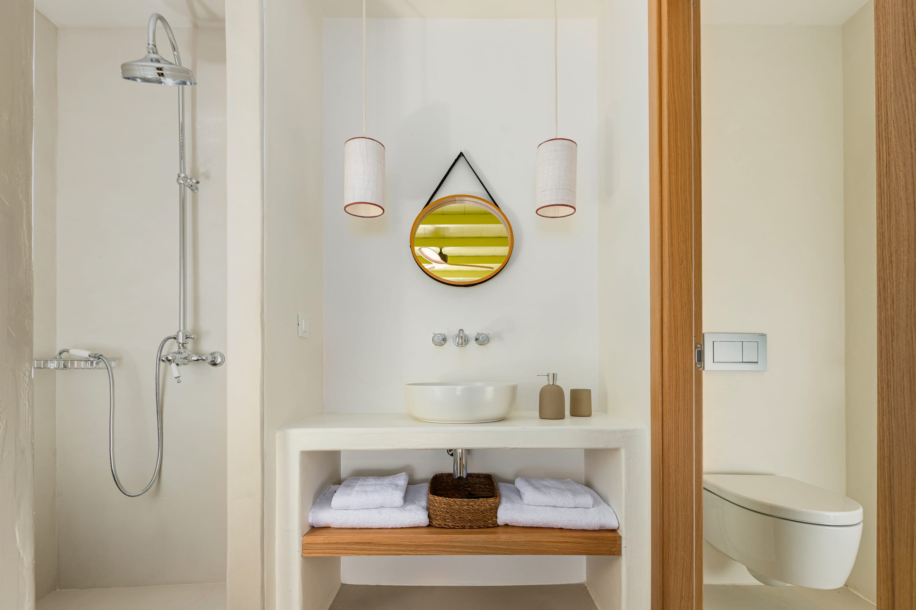 a bathroom with a mirror and sink