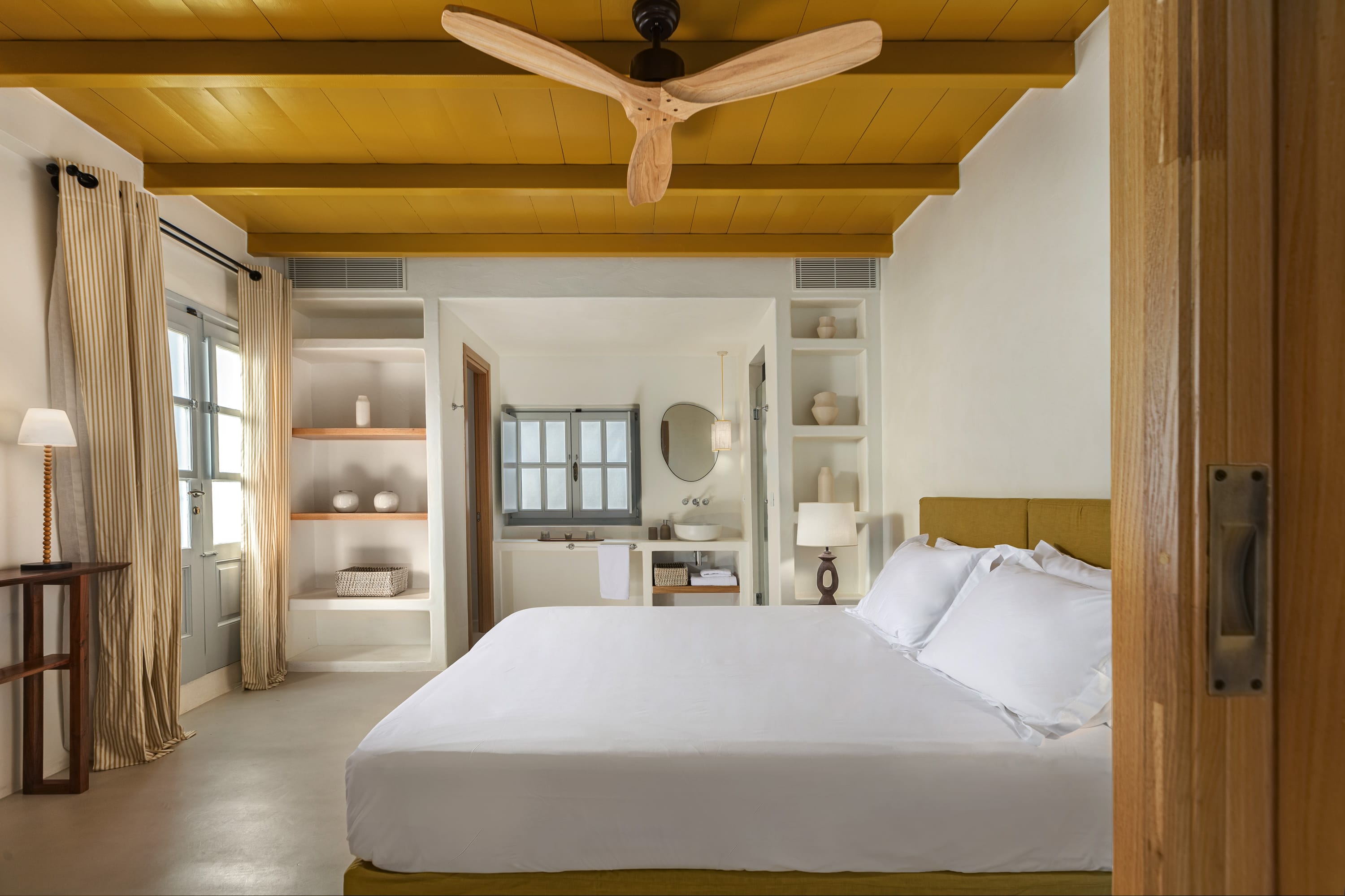 a bedroom with a large bed