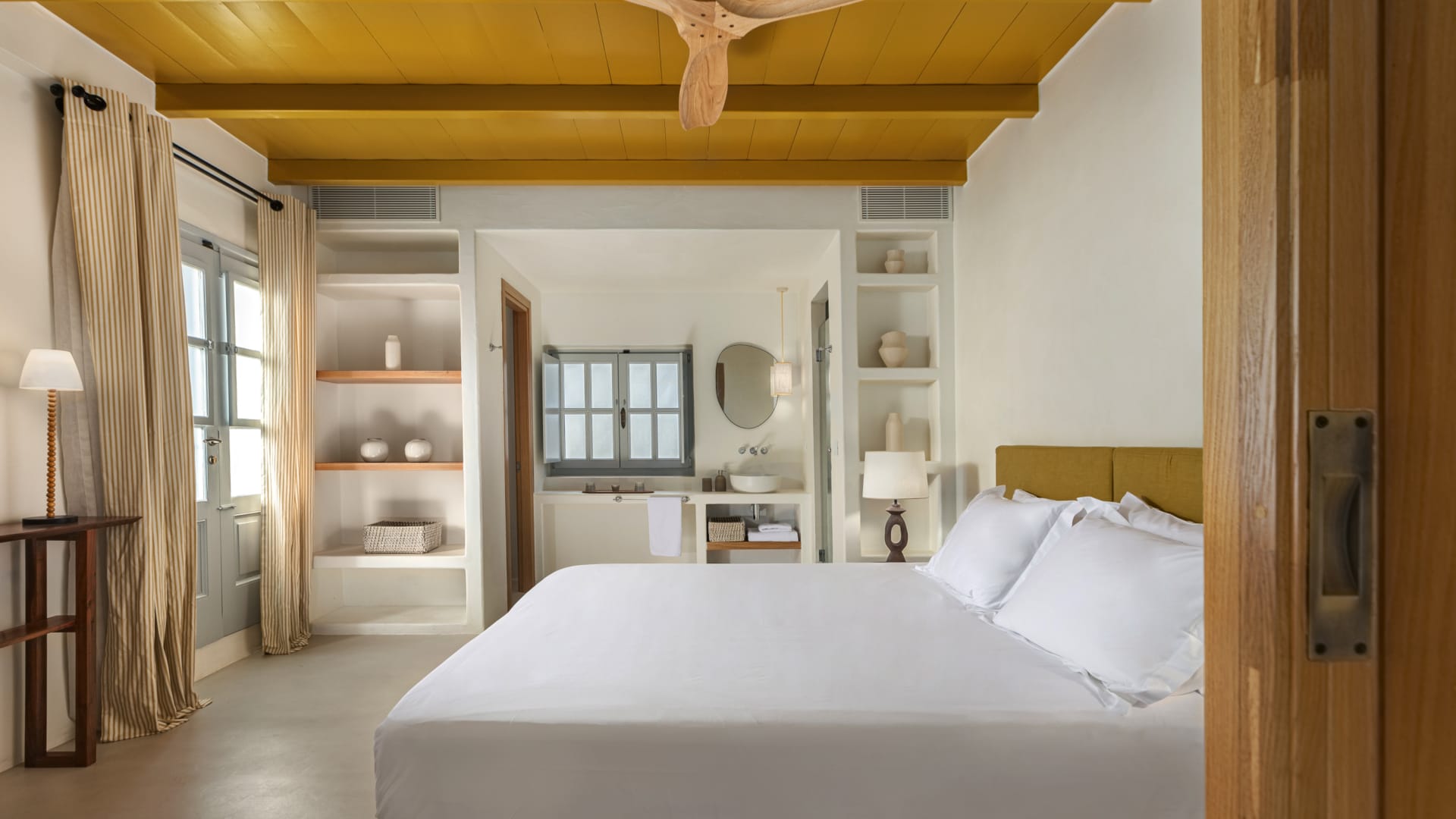 a bedroom with a large bed