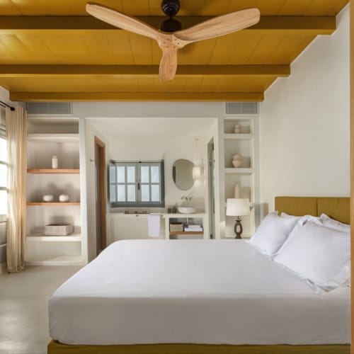 a bedroom with a large bed