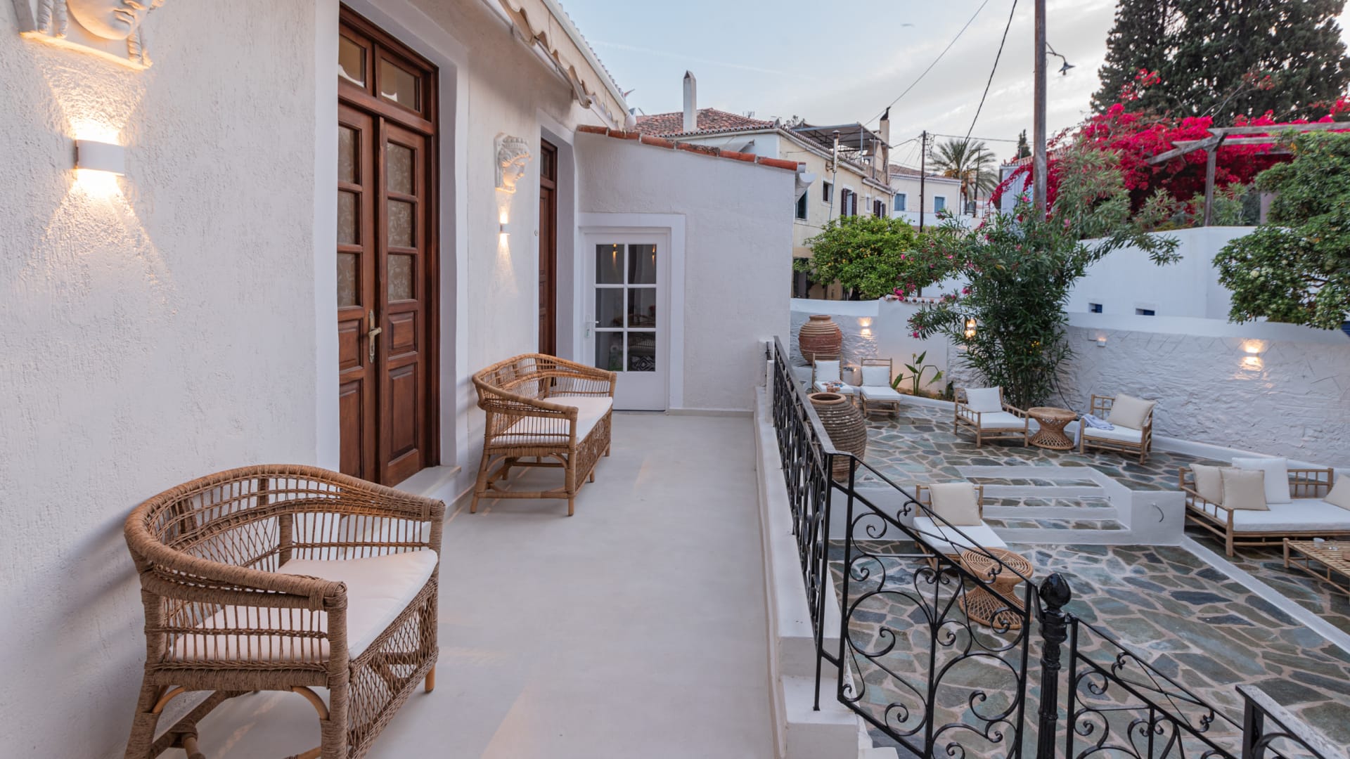 a patio with tables and chairs