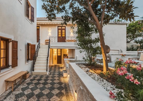 a house with a stone driveway