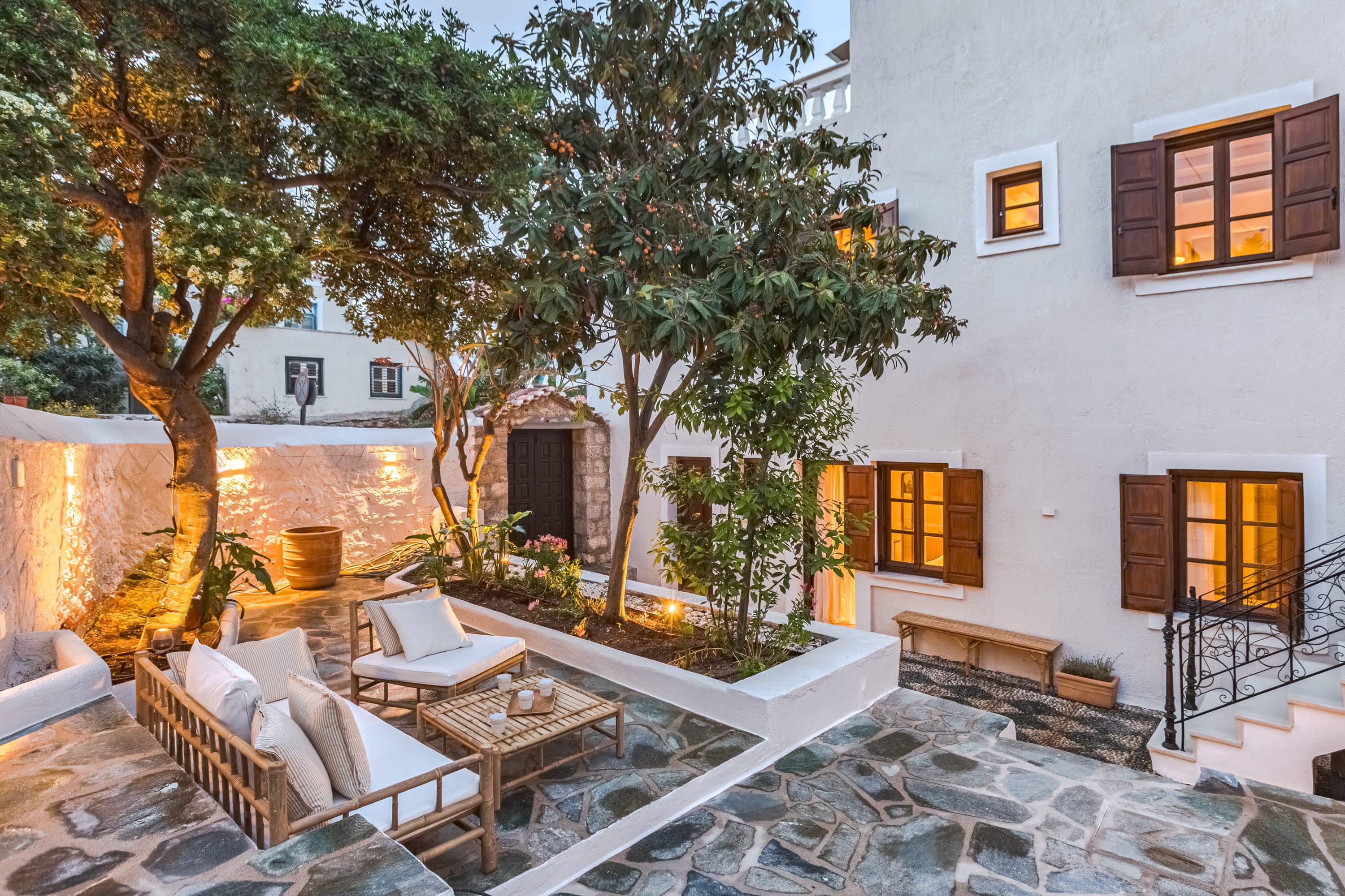 a modern looking house with a patio and a pool