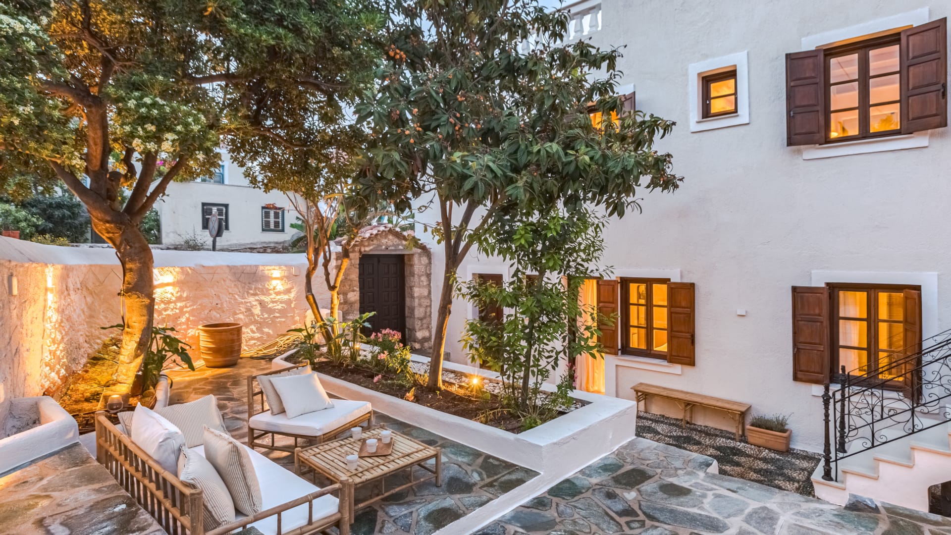 a modern looking house with a patio and a pool