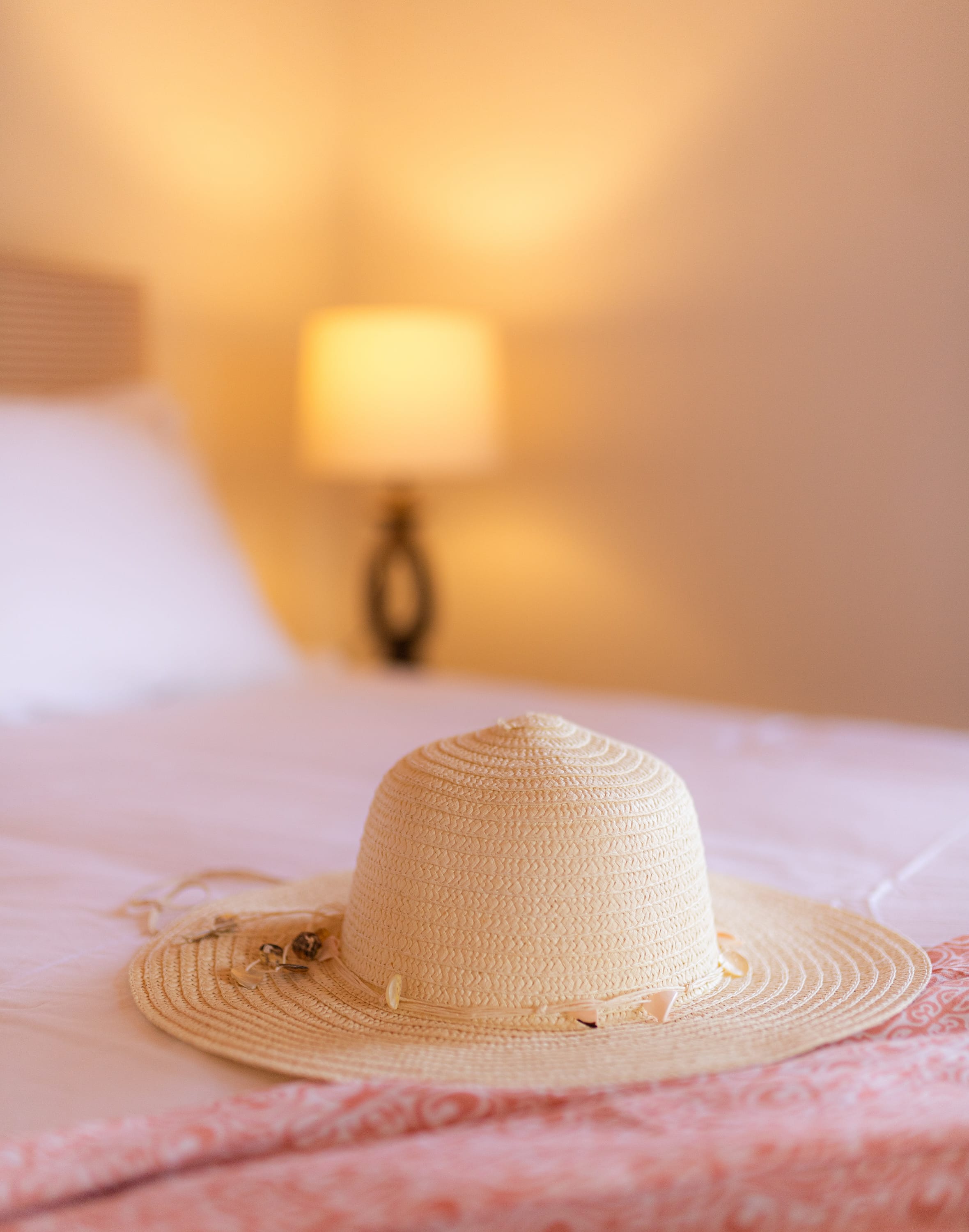 a hat on a bed