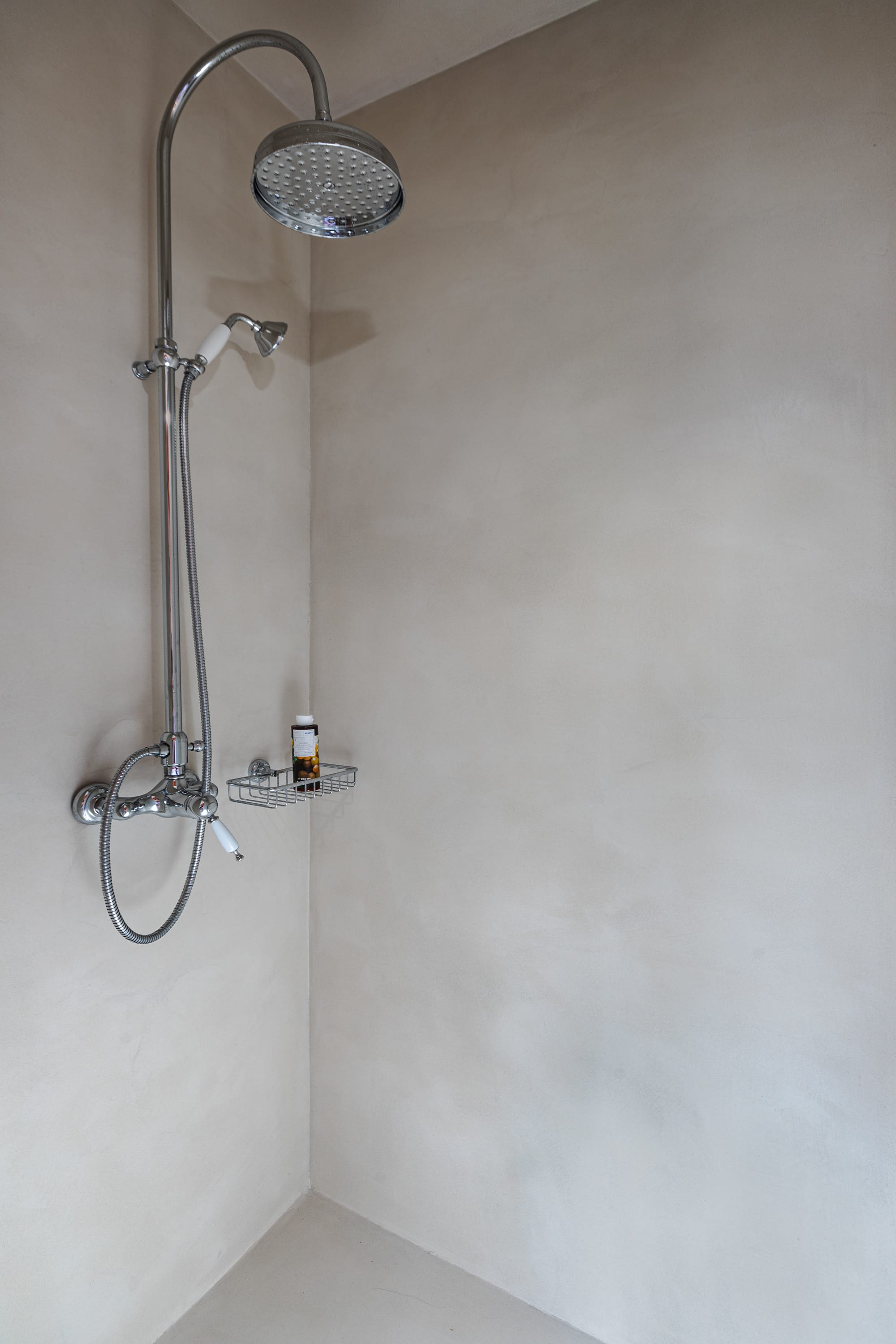 a shower head in a bathroom