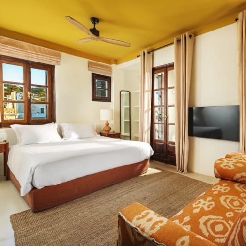 a bedroom with a large bed