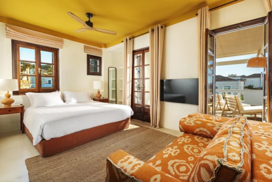 a bedroom with a large bed