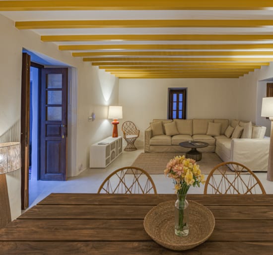 a living room with a couch and a table