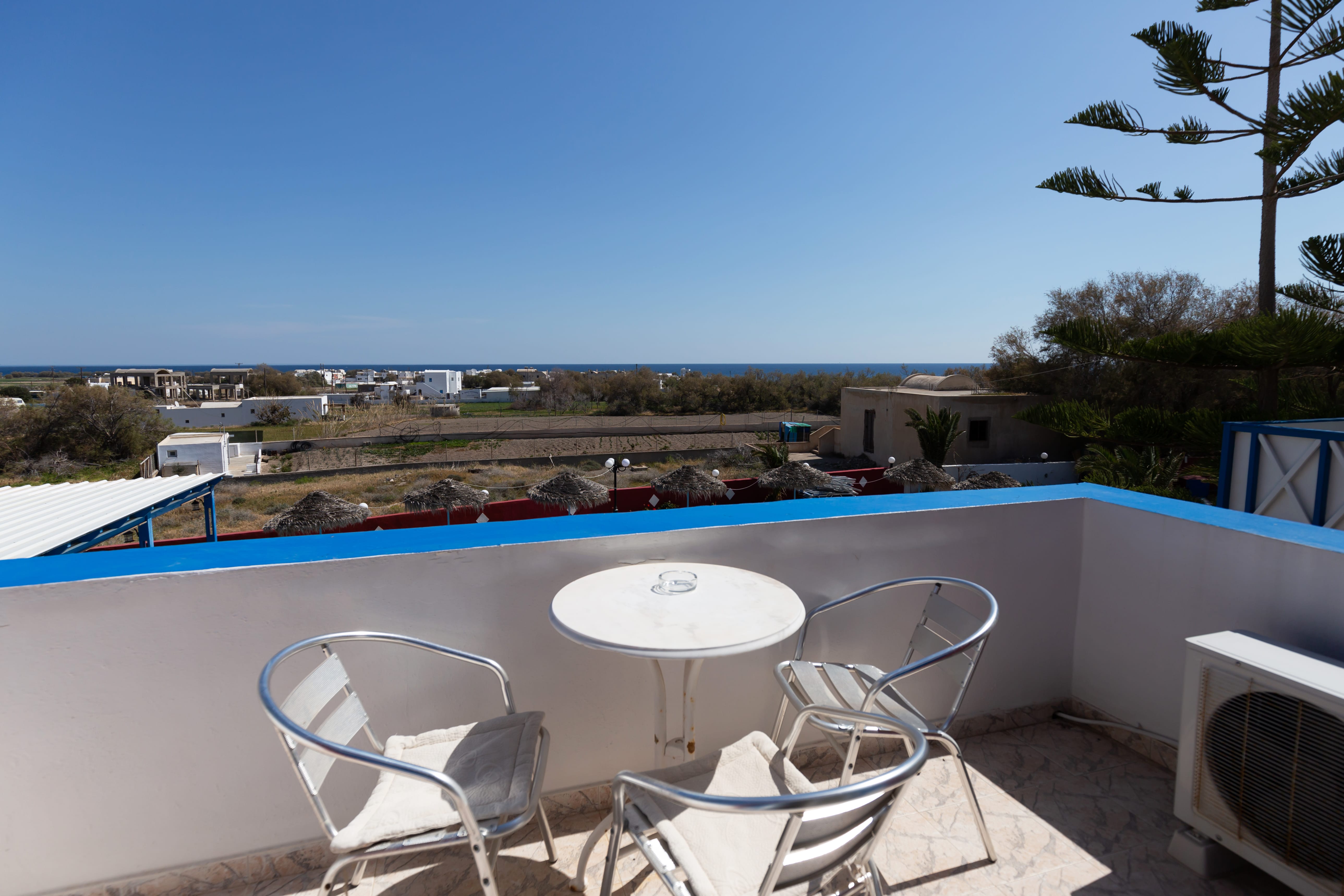 a pool with chairs around it