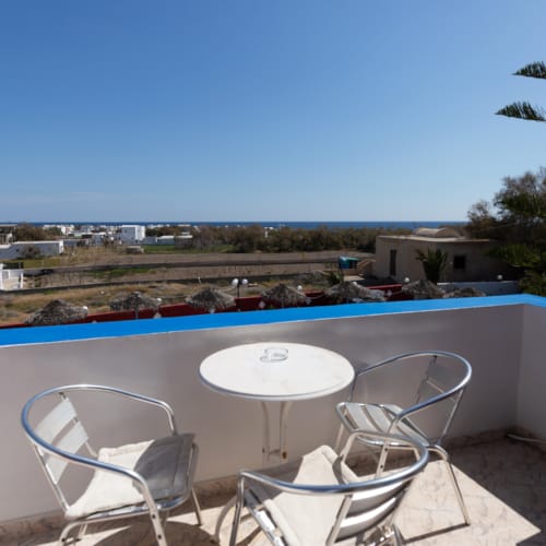 a pool with chairs around it