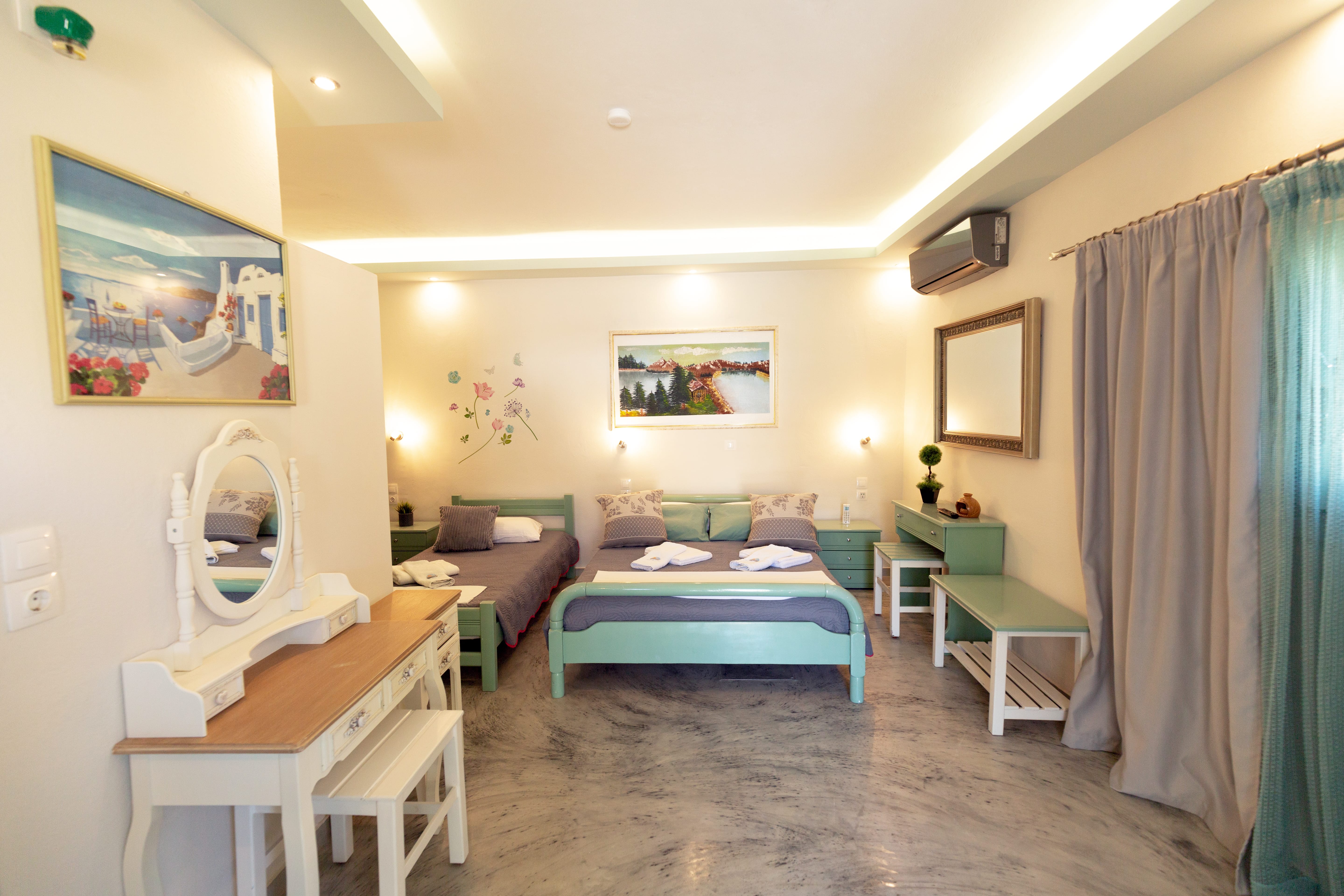 a bedroom with a bed and a desk