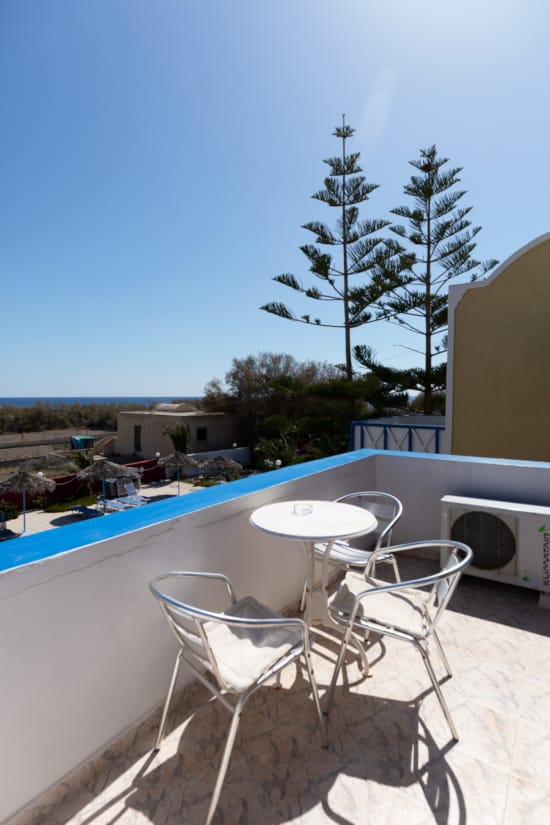 a pool with chairs around it
