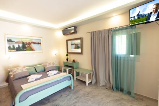 a living room with a couch and a tv