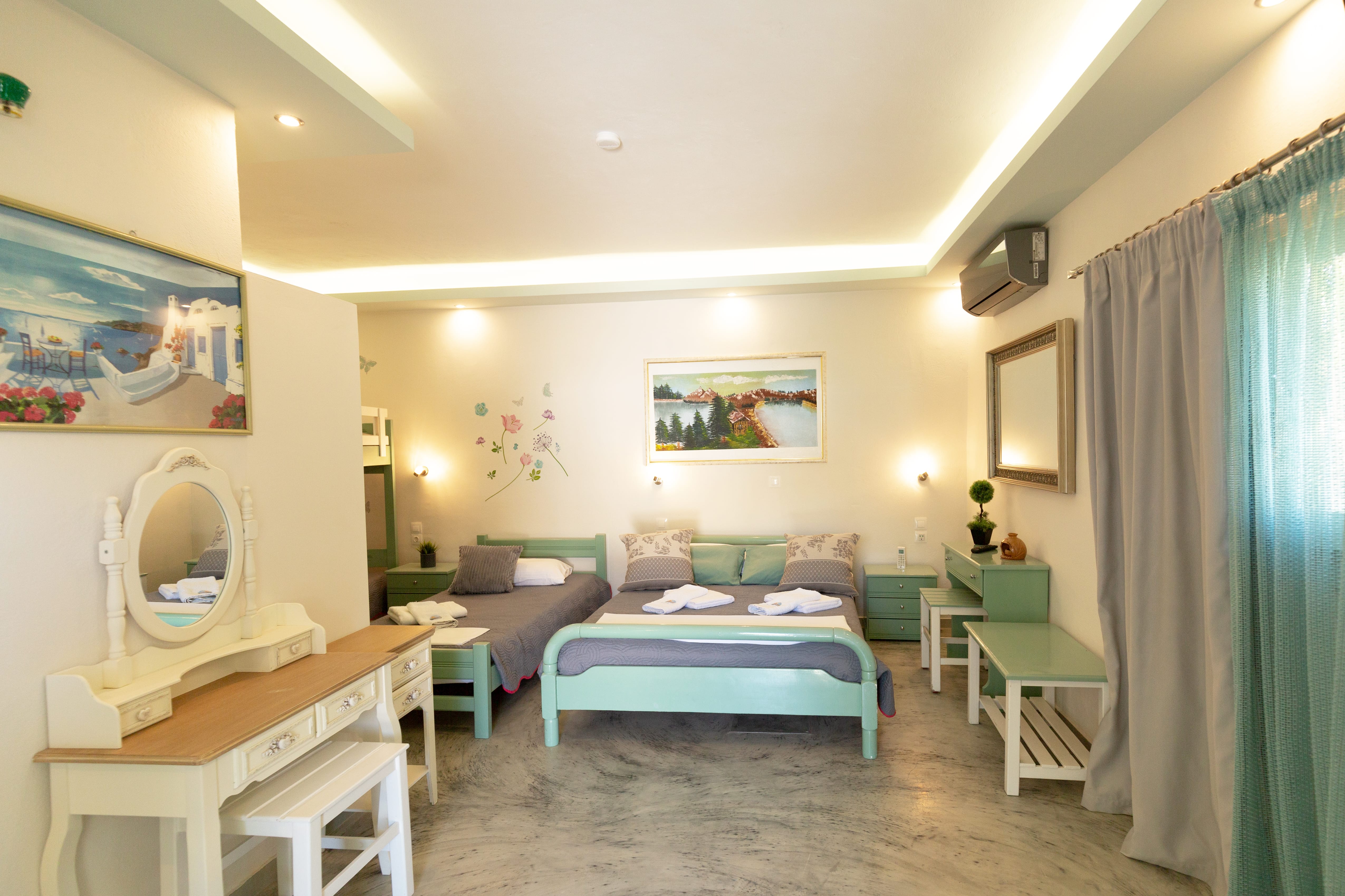 a room with a bed and a desk