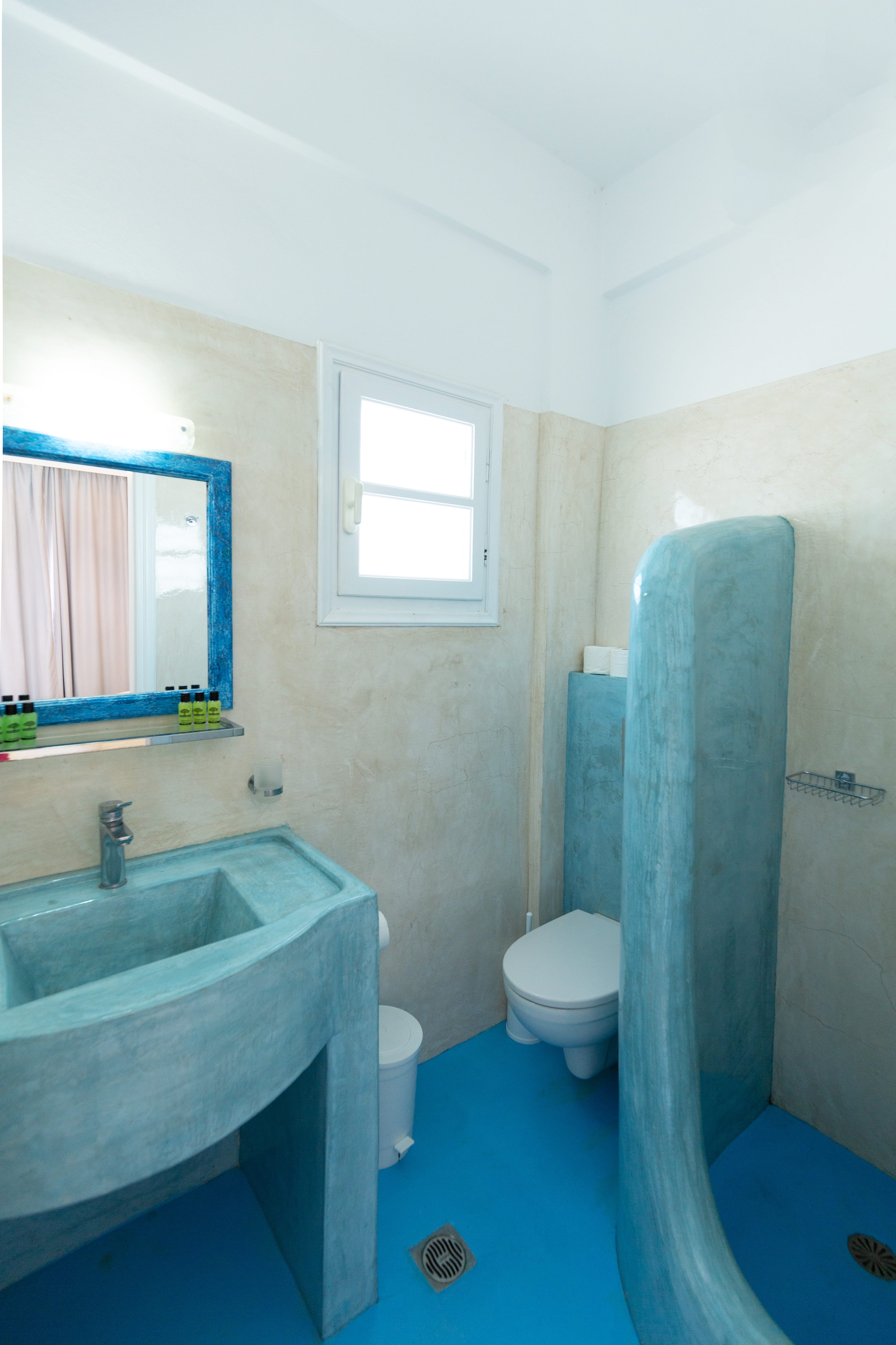 a bathroom with a sink and a toilet