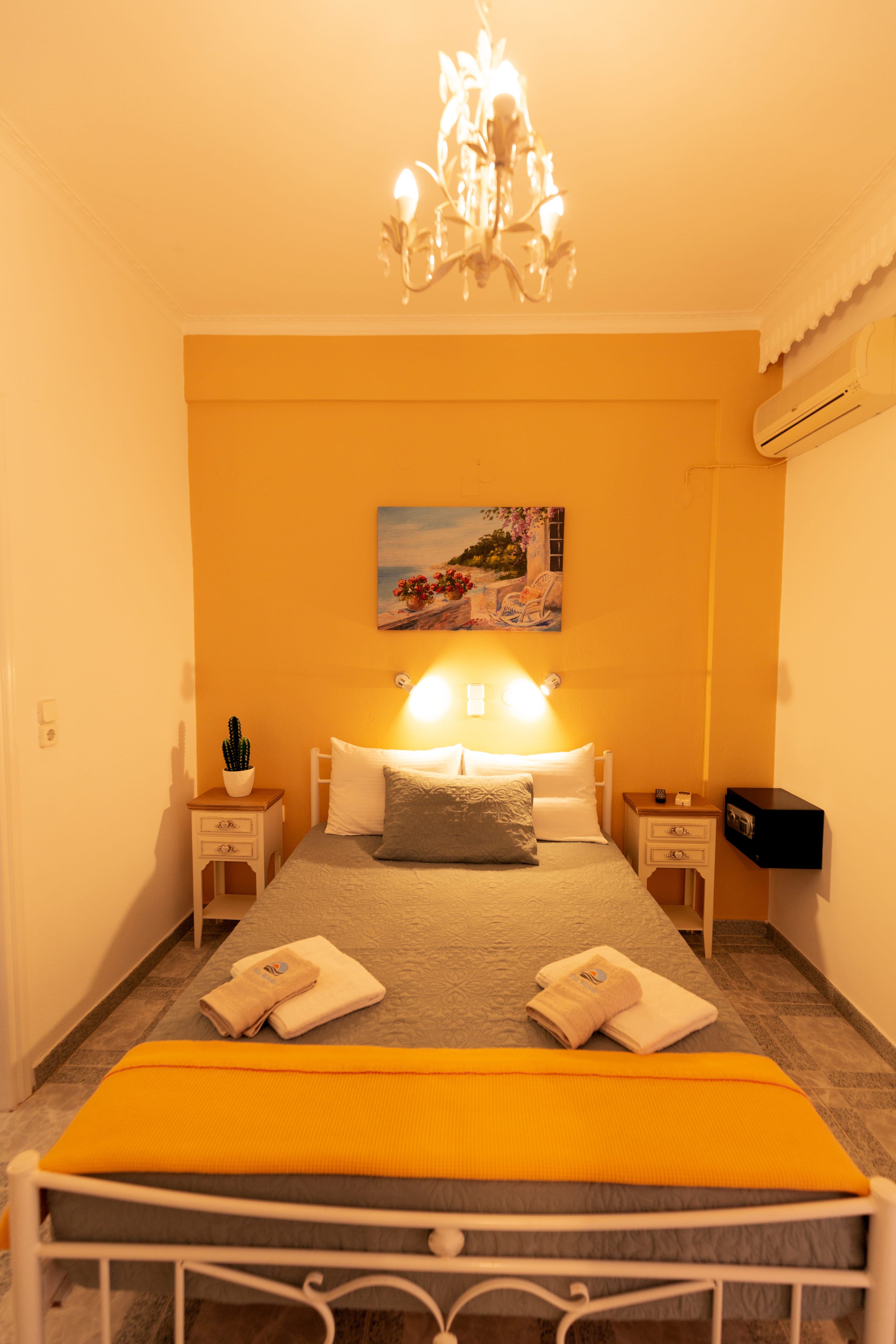 a bed with a lamp on it