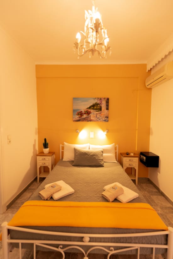 a bed with a lamp on it