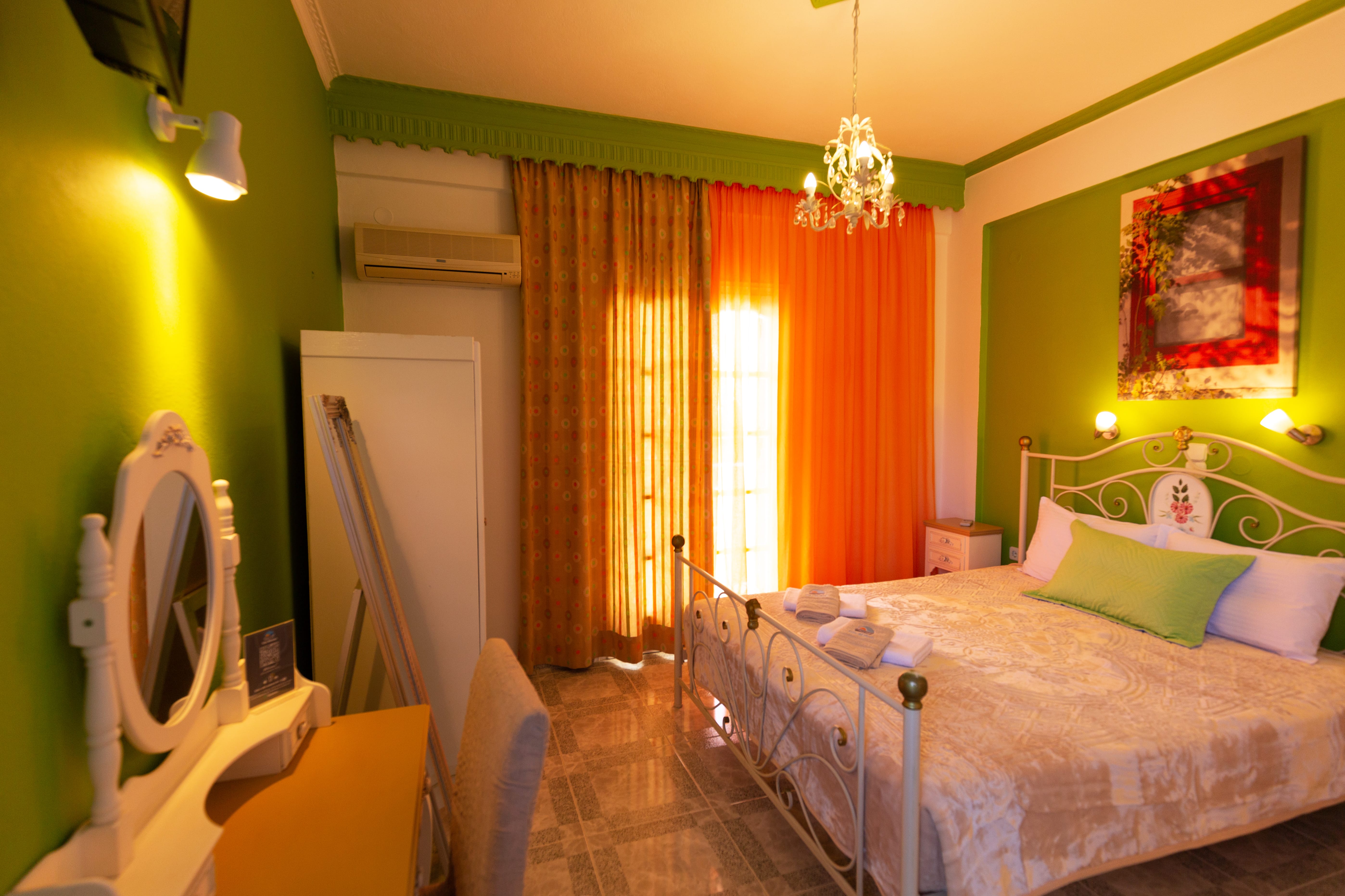 a bedroom with a bed and a chair